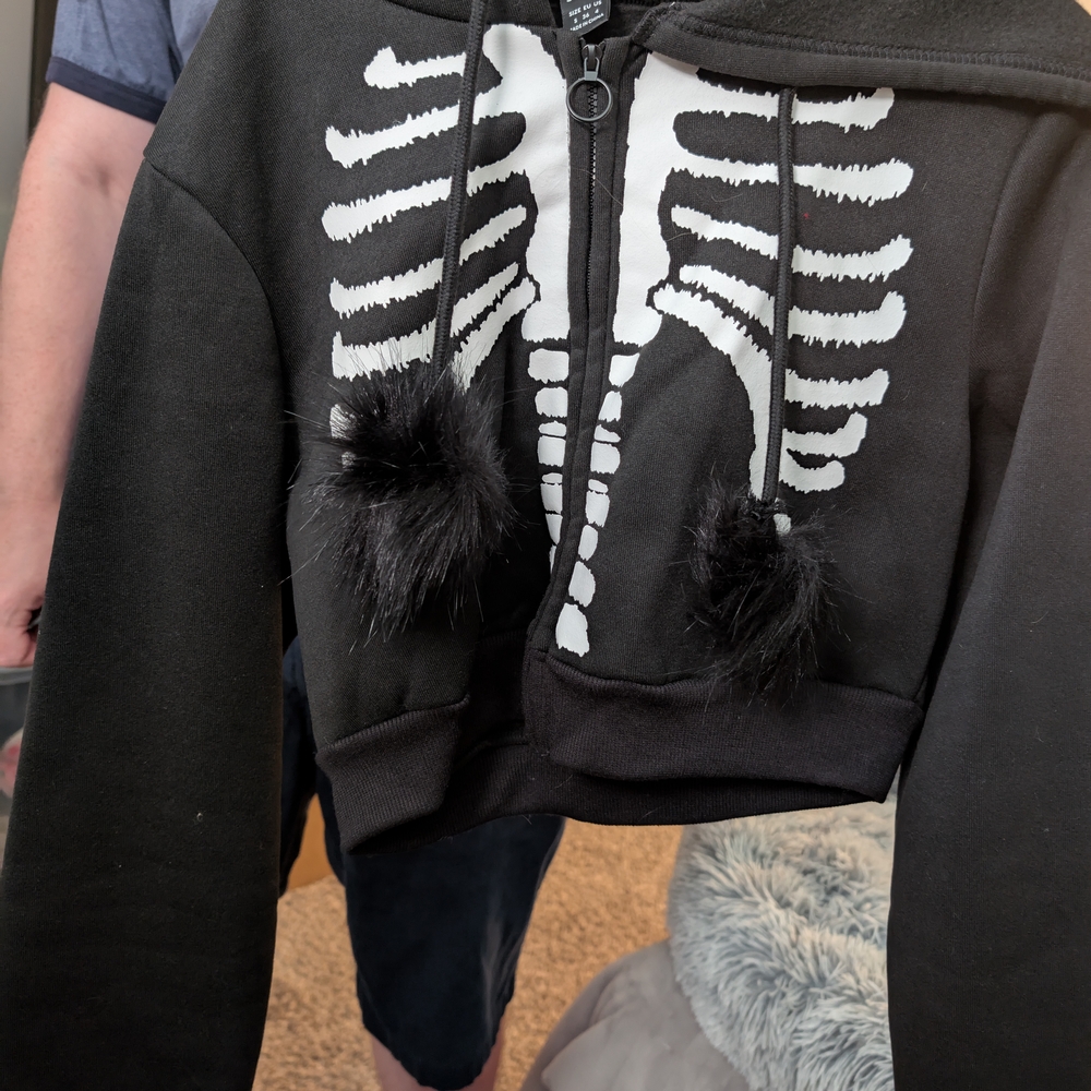 Black Skeleton Hoodie with Pom Poms